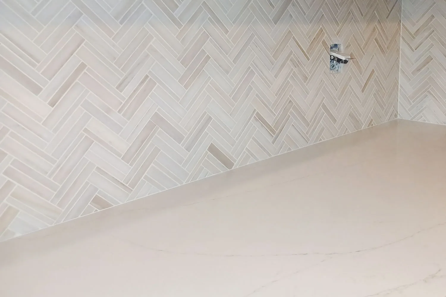 Kitchen remodel with herringbone backsplash