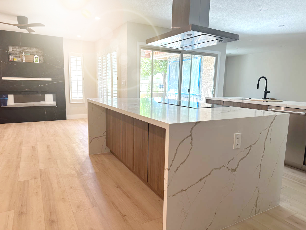 Kitchen remodel with quartz island and waterfall edges