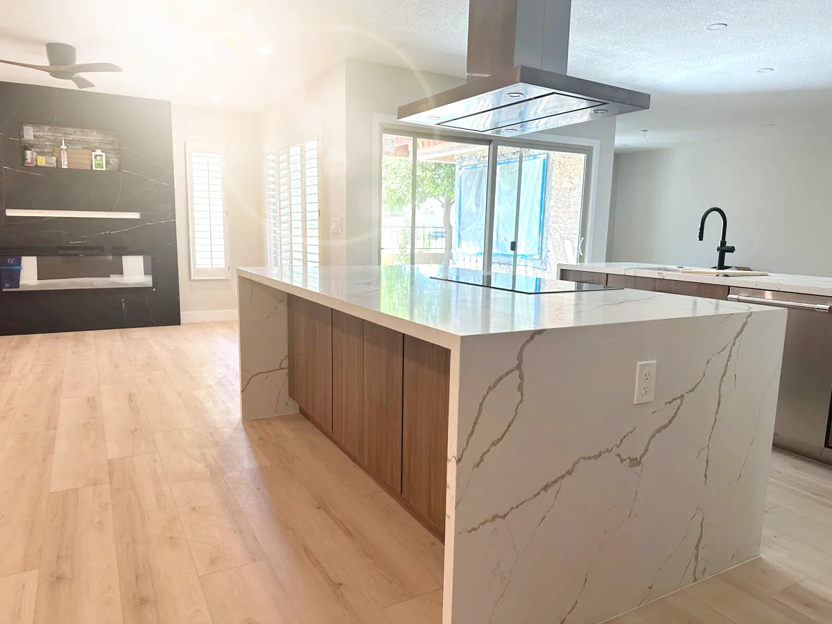 Kitchen remodel with quartz island and waterfall edges